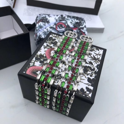 G*u*i-earrings