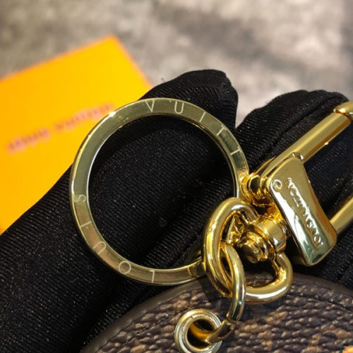 l0*is-V*t0n-stories-bag-charm-and-key-holder